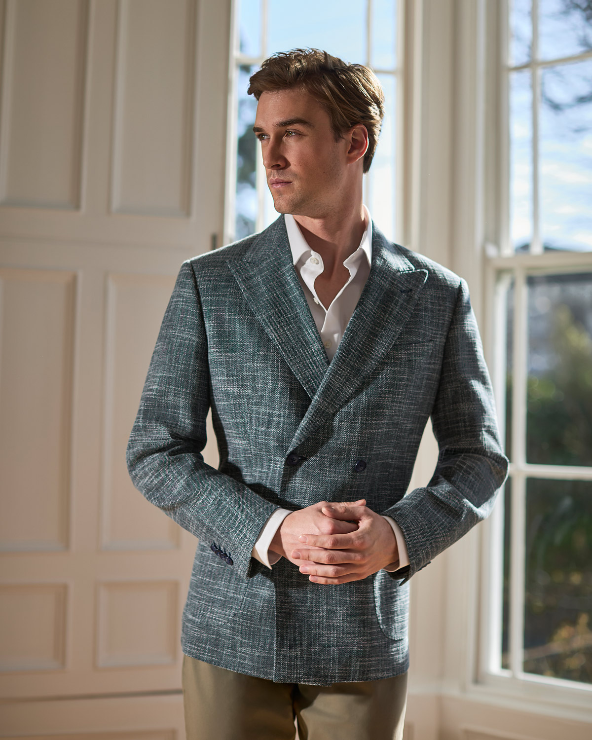Man in teal textured blazer
